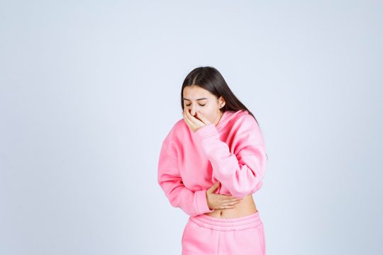 Girl is coughing or vomiting because of pregnancy
