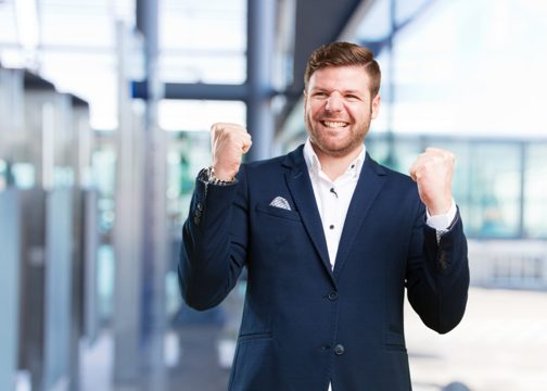 Young businessman happy expression