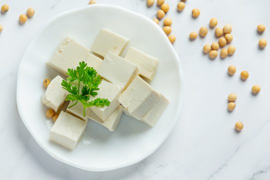 Tofu made from soybeans food nutrition concept.