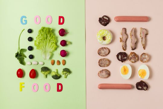 Flat lay comparison between vegetables and meat